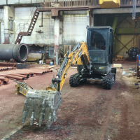 демонтаж  бетонных полов под новый станок  - миниэкскаватор